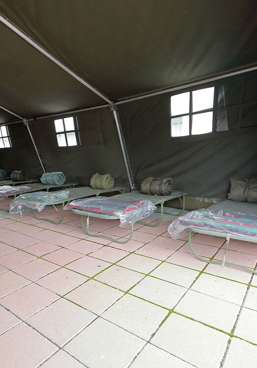 Tent shelter with temporary beds ready for natural disaster refuges
