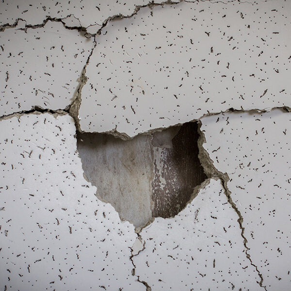 Damaged gypsum wall